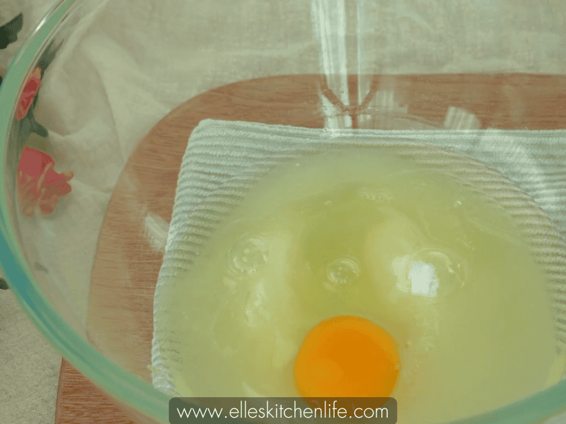 Whisking sugar, vegetable oil, and egg for the Red Velvet layer