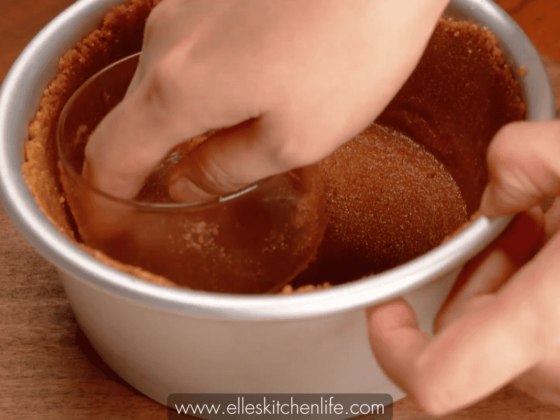 Step 1e: Press crust mixture into a springform pan